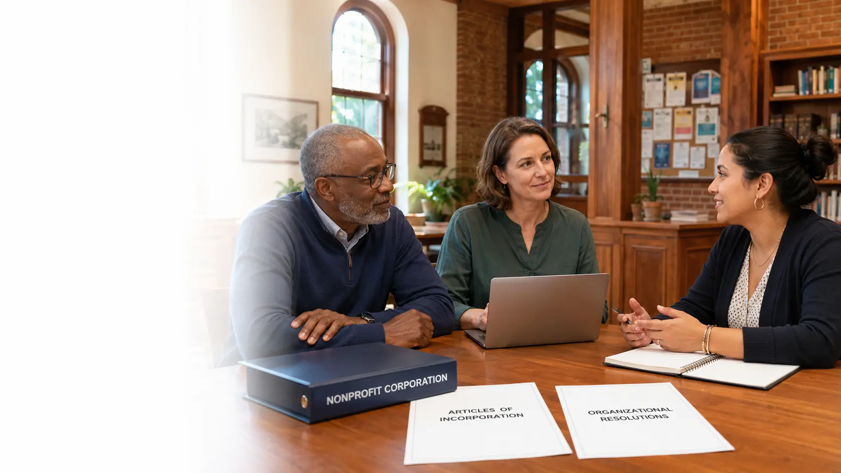 Nonprofit organizers with incorporation documents in a restored community building